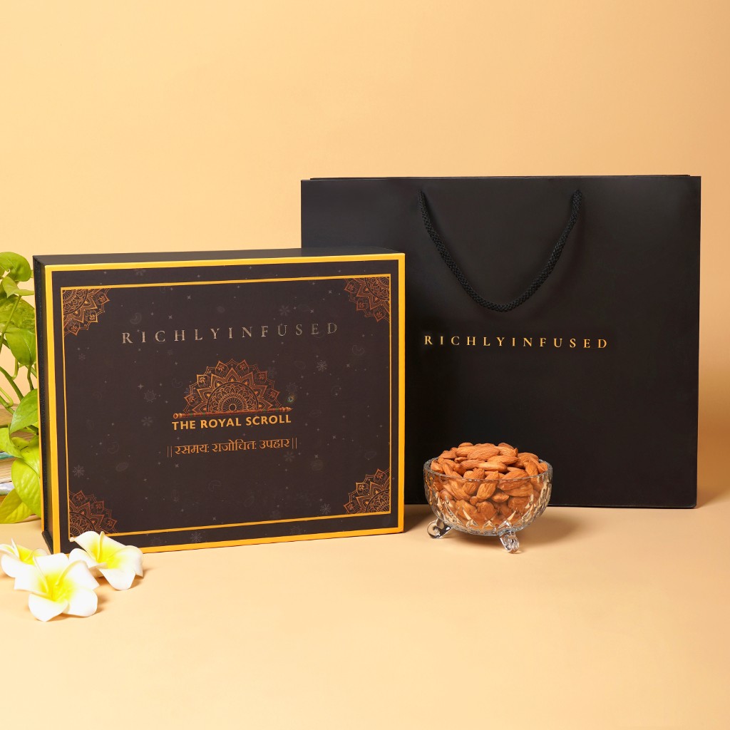 The Royal Scroll — premium black and gold gift box with matching carry bag